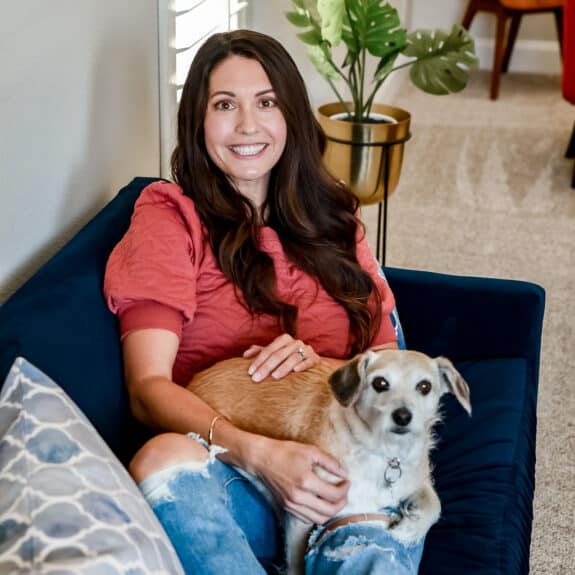 sitting on couch with dog